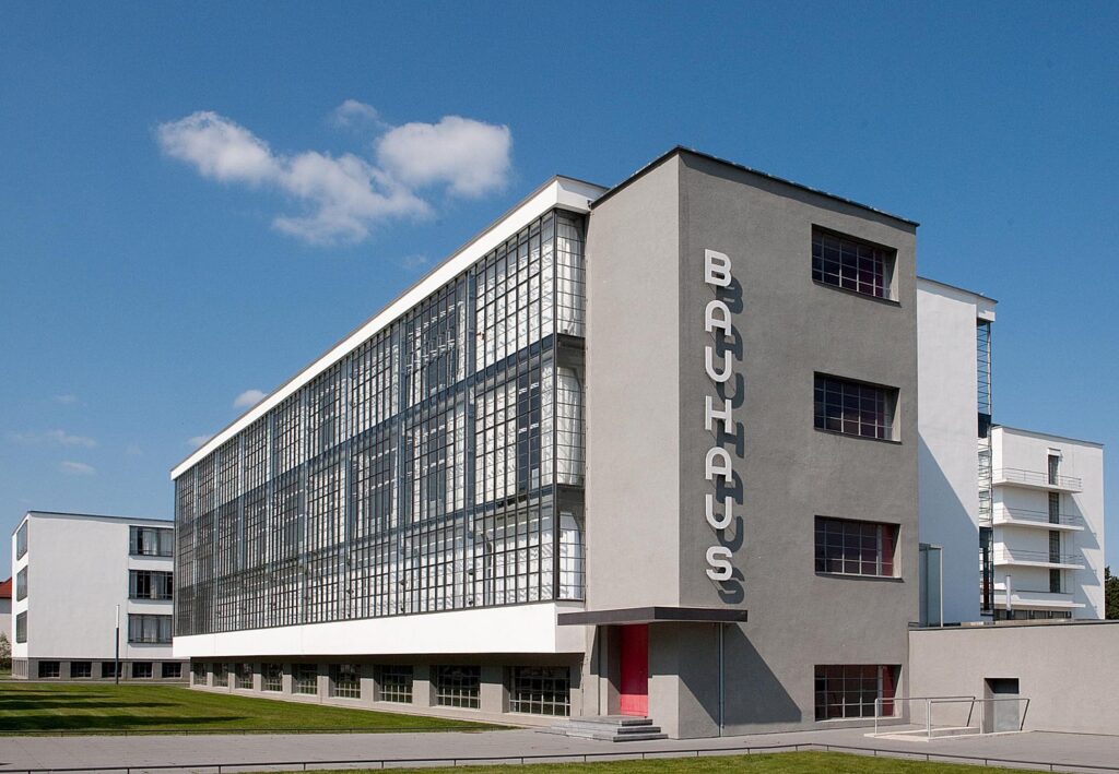 The Bauhaus School Building — an icon of European modernism; a purely functional architecture that presents the building as a rational system of light, structure, and transparency.